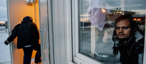 Un refugiado en un centro para los refugiados cerca de la frontera ruso-noruega (archivo) - Sputnik Mundo