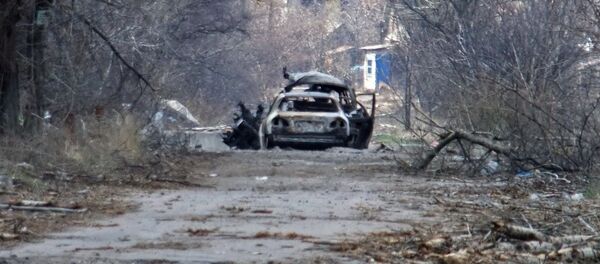 Сoche de periodistas destrozado en la región de Donetsk (archivo) - Sputnik Mundo