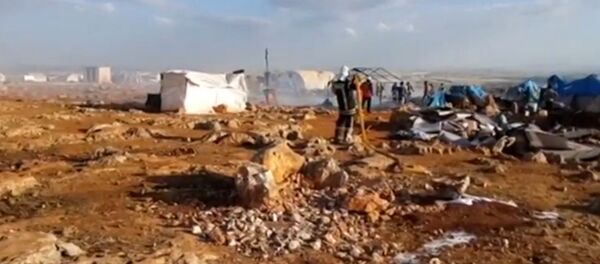 Campamento de refugiados en Idlib tras sufrir un ataque aéreo Campamento de refugiados en Idlib tras sufrir un ataque aéreo - Sputnik Mundo