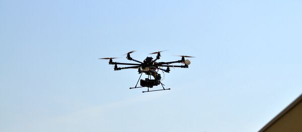 octocóptero volando - Sputnik Mundo