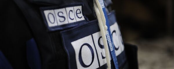 Un representante de la OSCE en Donbás (archivo) - Sputnik Mundo