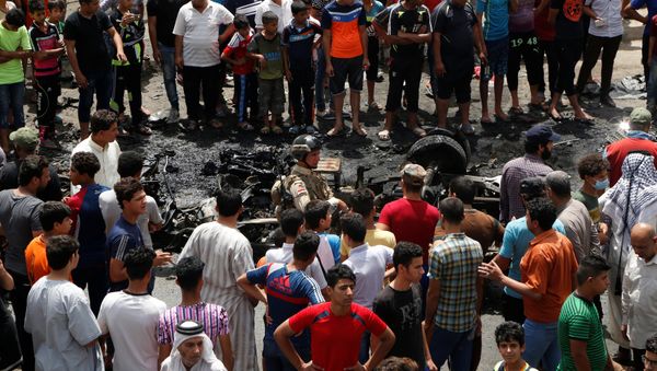 Lugar de la explosión en Bagdad Lugar de la explosión en Bagdad - Sputnik Mundo