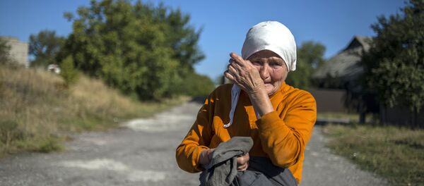 Una habitante de Donbás - Sputnik Mundo