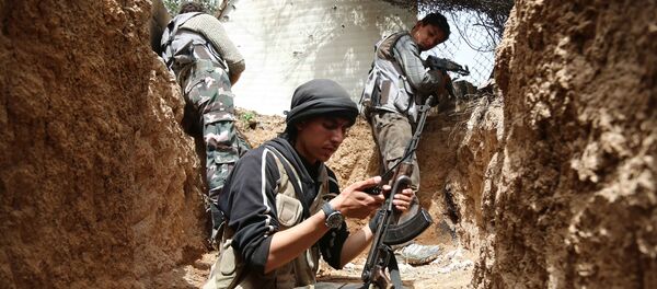 Combatientes del grupo opositor Yeish al Islam Combatientes del grupo opositor Yeish al Islam - Sputnik Mundo