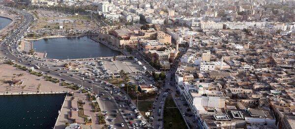 An aerial shot taken from a helicopter shows the Libyan capital Tripoli. (File) - Sputnik Mundo