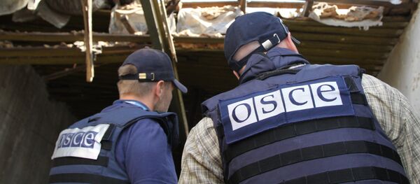 Los representantes de la OSCE en el este de Ucrania Los representantes de la OSCE en el este de Ucrania - Sputnik Mundo