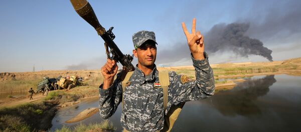 Militar iraquí durante la ofensiva para liberar la ciudad de Faluya (archivo) - Sputnik Mundo
