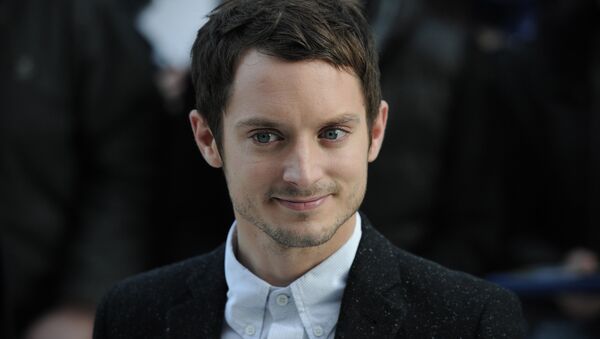 US actor Elijah Wood arrives to the European premiere of Happy Feet Two in central London on November 20, 2011. - Sputnik Mundo