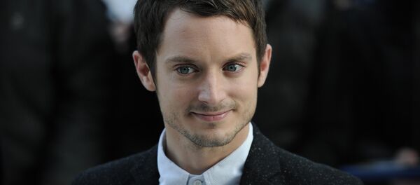 US actor Elijah Wood arrives to the European premiere of Happy Feet Two in central London on November 20, 2011. - Sputnik Mundo