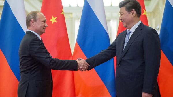 Presidente de Rusia, Vladímir Putin y presidente de China, Xi Jinping - Sputnik Mundo