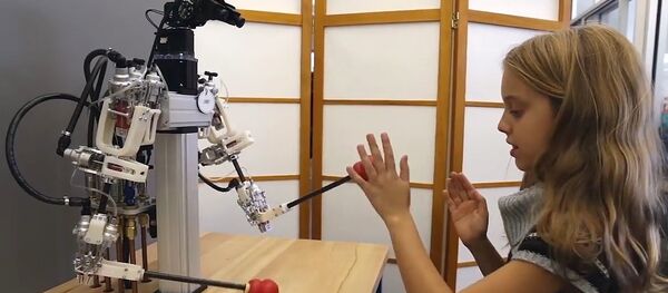 Un robot - Sputnik Mundo