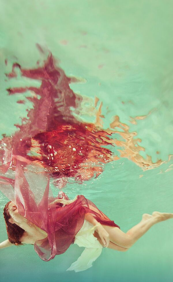 Las sirenas modernas: el hipnotizante arte submarino - Sputnik Mundo