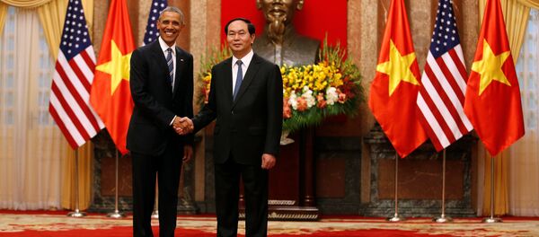 Presidente de EEUU Barack Obama y el presidente de Vietnam Tran Dai Quang Presidente de EEUU Barack Obama y el presidente de Vietnam Tran Dai Quang - Sputnik Mundo