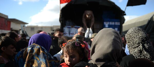 Entrega de la ayuda humanitaria rusa en Siria (archivo) Entrega de la ayuda humanitaria rusa en Siria (archivo) - Sputnik Mundo