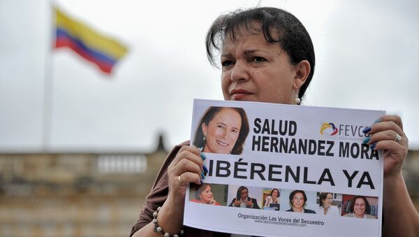 Demonstración en Bogotá para la liberación de la periodista española Salud Hernández Mora - Sputnik Mundo