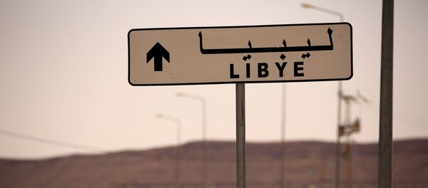 Un letrero Libia - Sputnik Mundo