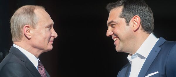 Vladímir Putin, el presidente de Rusia, y primer ministro de Grecia, Alexis Tsipras (archivo) - Sputnik Mundo