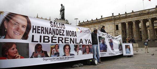 La gente pide la liberación de los periodistas secuestrados - Sputnik Mundo