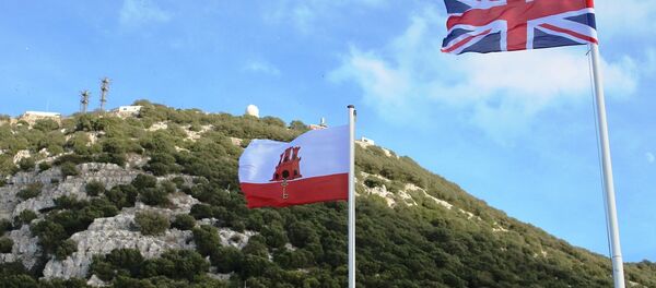 Banderas de Reino Unido y Gibraltar Banderas de Reino Unido y Gibraltar - Sputnik Mundo