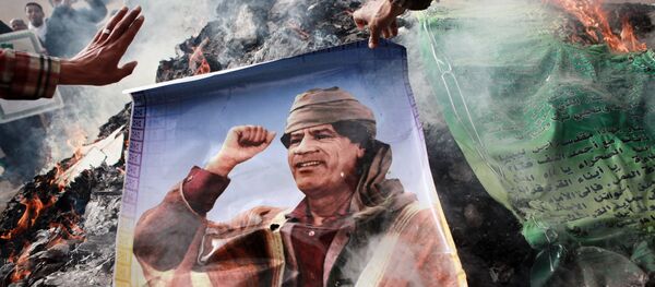 Retrato de Muamar Gadafi (archivo) Retrato de Muamar Gadafi (archivo) - Sputnik Mundo