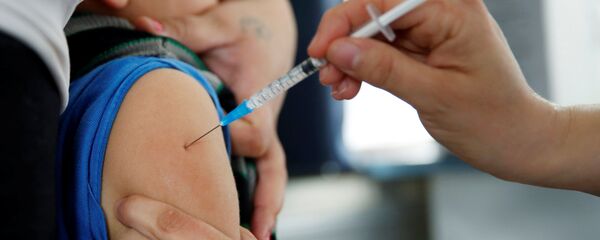 Vacuna contra el gripe H1N1 - Sputnik Mundo