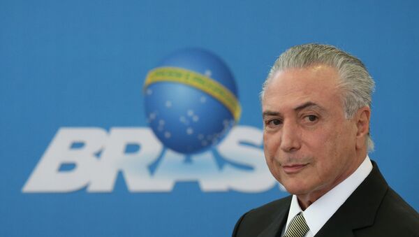 Brazil's acting President Michel Temer arrives for the inauguration ceremony of new presidents of state companies, at Planalto presidential palace in Brasilia, Brazil, Wednesday, June 1, 2016 - Sputnik Mundo