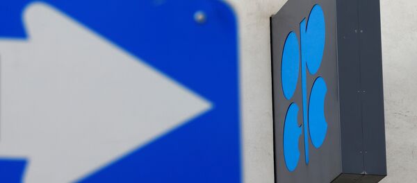 The OPEC logo is pictured behind a traffic sign at its headquarters in Vienna The OPEC logo is pictured behind a traffic sign at its headquarters in Vienna - Sputnik Mundo