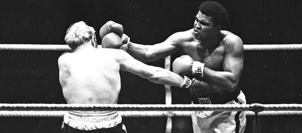 Muhammad Ali contra Richard Dunn, Alemania, 1976. Muhammad Ali contra Richard Dunn, Alemania, 1976. - Sputnik Mundo
