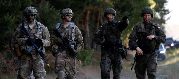 Soldados estadounidenses y polacos (archivo) Soldados estadounidenses y polacos (archivo) - Sputnik Mundo