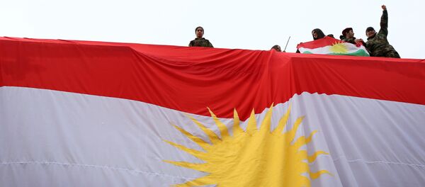 La bandera de Kurdistán iraquí - Sputnik Mundo