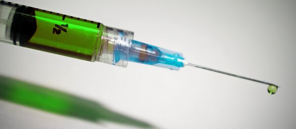 Una jeringa Una jeringa - Sputnik Mundo