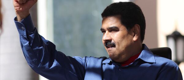 Venezuela's President Nicolas Maduro greets supporters during a rally in Caracas, Venezuela June 9, 2016. - Sputnik Mundo