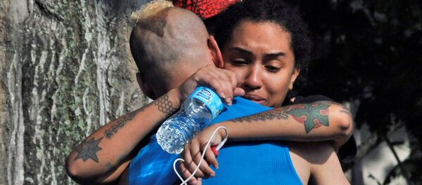 Los amigos y familiares de las víctimas del atentado de Orlando - Sputnik Mundo