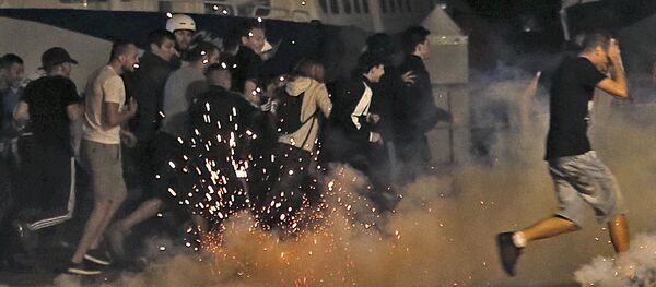 Hinchas durante la Eurocopa 2016 en Francia - Sputnik Mundo
