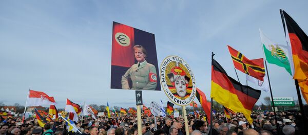 Seguidores del movimiento PEGIDA - Sputnik Mundo