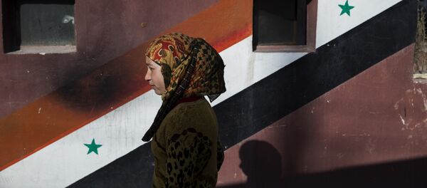 Una ciudadana siria - Sputnik Mundo