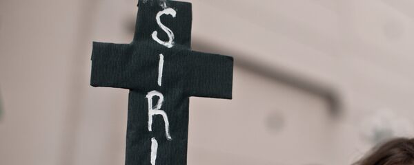 Manifestación en contra de la intervención militar de EEUU en Siria (archivo) - Sputnik Mundo