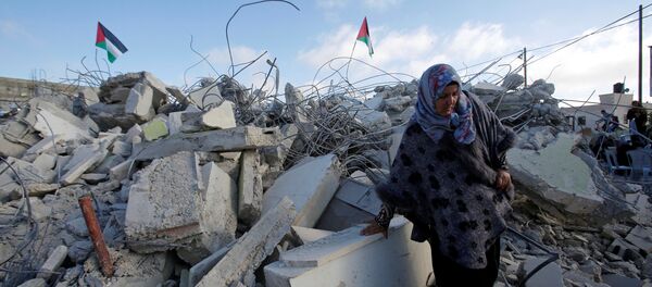 Demoliciones de casas palestinas en Cisjordania - Sputnik Mundo