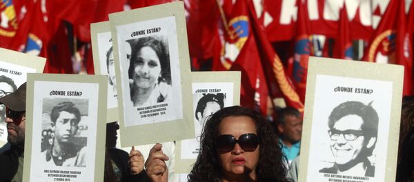 Una manifestación por los detenidos y desaparecidos en Chile durante la dictadura (archivo) - Sputnik Mundo
