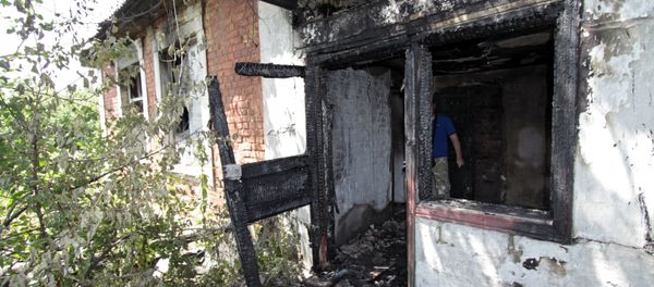 Casa destruida en Donetsk Casa destruida en Donetsk - Sputnik Mundo