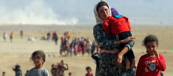 Kurdos yazidíes intentado huir de Daesh - Sputnik Mundo
