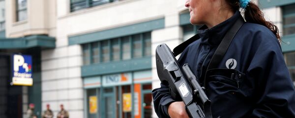 Una policía belga (archivo) - Sputnik Mundo