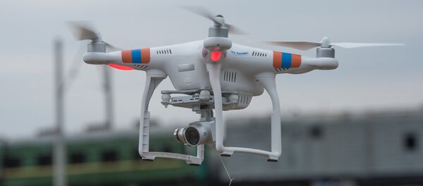 Un dron - Sputnik Mundo