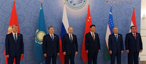 Integrantes de la OCS - Sputnik Mundo