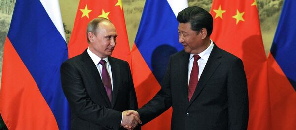 Presidente de Rusia, Vladímir Putin y presidente de China, Xi Jinping - Sputnik Mundo