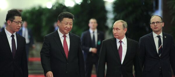 Presidente de Rusia, Vladímir Putin y presidente de China, Xi Jinping - Sputnik Mundo