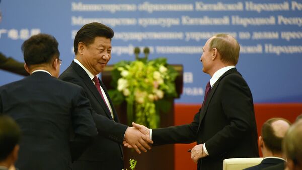 Presidente de China, Xi Jinping, y presidente de Rusia, Vladímir Putin - Sputnik Mundo