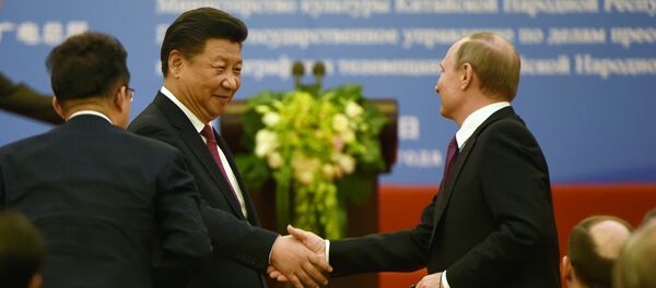 Presidente de China, Xi Jinping, y presidente de Rusia, Vladímir Putin - Sputnik Mundo