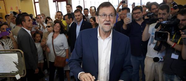 Líder del PP y el primer ministro español en funciones, Mariano Rajoy, vota en Madrid - Sputnik Mundo