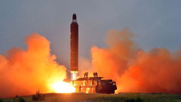 A test launch of ground-to-ground medium long-range ballistic rocket Hwasong-10 - Sputnik Mundo